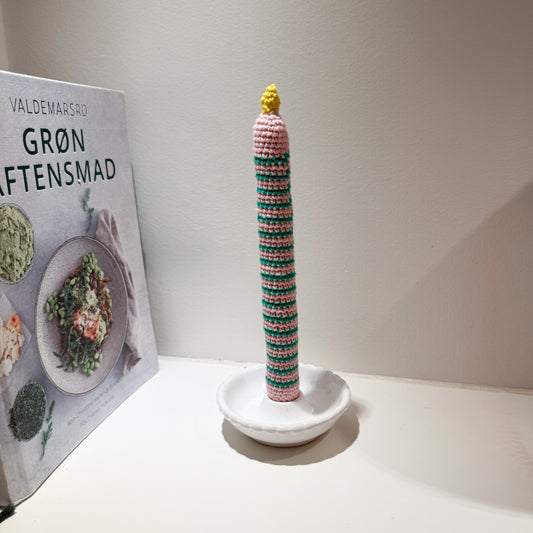 pink and green crochet striped candle for decoration loopelle atelier